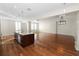 Hardwood floors and an open floor plan in this spacious living area at 405 Central Ave # 210, St Petersburg, FL 33701