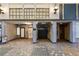 Building lobby with tile floors and elevator at 405 Central Ave # 210, St Petersburg, FL 33701