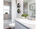 Clean bathroom with a bathtub, sink, and decorative accents at 6929 161St E Ter, Parrish, FL 34219