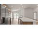 Modern kitchen with stainless appliances, a large center island, and plenty of natural light at 6929 161St E Ter, Parrish, FL 34219