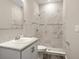 The bathroom features a shower, updated finishes, and a sleek vanity at 2634 58Th E Cir, Palmetto, FL 34221