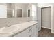 This spacious bathroom features double sinks, a large mirror, and ample storage at 2634 58Th E Cir, Palmetto, FL 34221