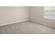 This bedroom offers neutral walls and plush, cozy carpeting for comfortable living at 2634 58Th E Cir, Palmetto, FL 34221