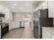 This modern kitchen boasts stainless steel appliances and ample counter space at 2634 58Th E Cir, Palmetto, FL 34221