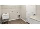 This practical laundry room offers counter space, and modern fixtures for efficient chores at 2634 58Th E Cir, Palmetto, FL 34221