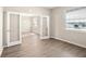 This living room boasts hard wood flooring and is filled with natural light at 2634 58Th E Cir, Palmetto, FL 34221