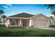One-story home with a two-car garage and landscaped front yard at 2650 58Th E Cir, Palmetto, FL 34221