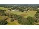 Wide aerial view of expansive property and surrounding area at 4911 W Sam Allen Rd, Plant City, FL 33565