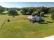 Aerial view of a barn and surrounding land at 4911 W Sam Allen Rd, Plant City, FL 33565
