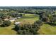 Aerial view of property showing large lot and buildings at 4911 W Sam Allen Rd, Plant City, FL 33565