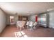 Outdoor kitchen with stainless steel appliances and brick flooring at 4911 W Sam Allen Rd, Plant City, FL 33565