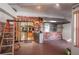 Brick outdoor kitchen with stainless steel appliances and a view of the interior at 4911 W Sam Allen Rd, Plant City, FL 33565
