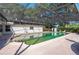 Relaxing pool area with screened enclosure and fountain at 4911 W Sam Allen Rd, Plant City, FL 33565