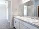 Double vanity bathroom with white cabinets at 2504 58Th E Cir, Palmetto, FL 34221