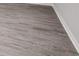 Grey wood-look vinyl plank flooring at 2504 58Th E Cir, Palmetto, FL 34221