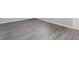 Grey wood-look vinyl plank flooring at 2504 58Th E Cir, Palmetto, FL 34221