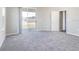Living room with sliding glass doors leading to patio at 2504 58Th E Cir, Palmetto, FL 34221