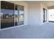 Covered patio with sliding glass doors and concrete flooring at 2504 58Th E Cir, Palmetto, FL 34221