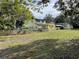 Generous backyard with mature trees offering privacy and fencing at 750 Charlie Taylor Rd, Plant City, FL 33566
