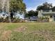 Spacious backyard featuring a combination wood and chainlink fence and shade trees at 750 Charlie Taylor Rd, Plant City, FL 33566