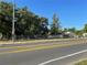 Exterior view of home on a large, fenced lot and double yellow lines at 750 Charlie Taylor Rd, Plant City, FL 33566