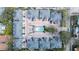 Overhead view of community townhomes with a central pool, showcasing a convenient and well-planned residential layout at 2311 W Morrison Ave # 13, Tampa, FL 33629