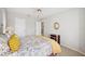 This bedroom features natural lighting, a ceiling fan, and carpeted floor at 2311 W Morrison Ave # 13, Tampa, FL 33629
