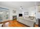 Cozy living room featuring a fireplace and French doors at 2311 W Morrison Ave # 13, Tampa, FL 33629