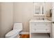 Classic powder room featuring a pedestal sink and modern fixtures at 2311 W Morrison Ave # 13, Tampa, FL 33629
