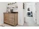 Charming coffee station with a coffee maker, decorative shelves, and lovely decor accents at 11658 Bluestone Ct, Parrish, FL 34219