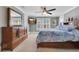 Well-appointed main bedroom featuring a dresser, comfortable carpet, and plantation shutters for privacy at 319 W Giddens Ave # 1/2, Tampa, FL 33603