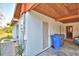 Exterior view of the house with the air conditioning unit and door at 1413 May St, Lutz, FL 33548