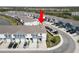 Aerial view of townhome community; unit has a driveway and sidewalks at 8680 Falling Blue Pl, Riverview, FL 33578