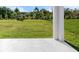 Expansive backyard featuring a lush lawn and views of the surrounding trees at 6925 161St E Ter, Parrish, FL 34219