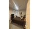 Spacious bedroom featuring a ceiling fan, a large window and a work space at 8623 Snowy Owl Way, Tampa, FL 33647