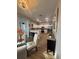 Dining area with chandelier is conveniently located near kitchen at 8623 Snowy Owl Way, Tampa, FL 33647