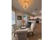 Bright dining area adjacent to kitchen offers seating for four at 8623 Snowy Owl Way, Tampa, FL 33647