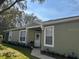 Charming single story home with landscaped front yard and covered entrance at 8623 Snowy Owl Way, Tampa, FL 33647