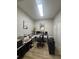 Well-lit home office with built-in storage at 8623 Snowy Owl Way, Tampa, FL 33647