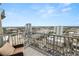 Balcony with a chair, overlooking the city with a clear blue sky above at 777 N Ashley Dr # 2313, Tampa, FL 33602