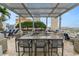 Rooftop grilling area with sink under a shaded pergola, perfect for entertaining at 777 N Ashley Dr # 2313, Tampa, FL 33602