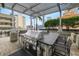 Rooftop grilling area under a shaded pergola, perfect for entertaining at 777 N Ashley Dr # 2313, Tampa, FL 33602