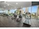 State-of-the-art gym features cardio equipment with city views at 777 N Ashley Dr # 2313, Tampa, FL 33602