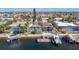 Waterfront homes with private docks and swimming pools, offering luxurious waterfront living with boating access at 5509 Pilots Pl, New Port Richey, FL 34652