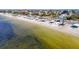 Beautiful beach with clear, shallow waters perfect for wading and relaxation at 5509 Pilots Pl, New Port Richey, FL 34652