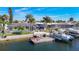 Charming waterfront property with a boat dock, boat lift, and pool, perfect for waterfront living at 5509 Pilots Pl, New Port Richey, FL 34652