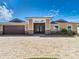Charming single-story home featuring a paved driveway and a welcoming entryway with decorative accents at 5509 Pilots Pl, New Port Richey, FL 34652