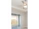 Bedroom showcasing ceiling fan, neutral color palette, sliding glass door providing lanai access at 6058 Barracuda Loop, Wimauma, FL 33598
