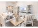 Bright living room featuring stylish decor, comfortable seating, and an inviting atmosphere at 6949 161St E Ter, Parrish, FL 34219