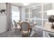 Bright home office with a desk, comfortable chairs, and decorative wall paneling at 6949 161St E Ter, Parrish, FL 34219